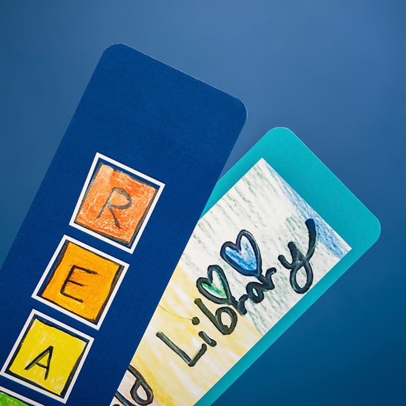 A close-up view of vibrant, printed bookmarks.